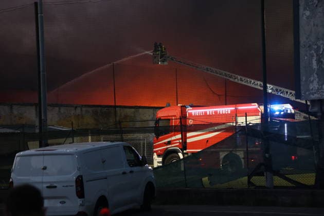 Fire broke out at a shipping company s warehouse in Milan MILAN, ITALY - JULY 8: Firefighters work to extinguish the blaze a fire breaks out at the 8,000-square-meter warehouse of an international shipping company on Don Giovanni Minzoni Street in the Bovisa district of Milan, Italy on July 8, 2026. Civil defense personnel and municipal police established an extensive security perimeter around the warehouse while the cause of the fire has not yet been determined. Michele Luigi Edoardo Novaga Anadolu Milan Italy. Editorial use only. Please get in touch for any other usage.  Copyright: x2026xAnadoluxMichelexLuigixEdoardoxNovagax