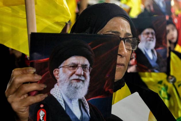 July 8, 2026, Beirut, Beirut, Lebanon: A pro-Iranian Hezbollah supporter weeps as she holds a picture of assassinated Iranian Supreme Leader Ayatollah Ali Khamenei during a memorial ceremony mourning the Iranian slain leader in Beirut southern suburb. . Iran began six days of public funeral ceremonies for Khamenei on July 4, including a dedicated day to neighboring Iraq, a Shia powerhouse with close ties to Tehran. Beirut Lebanon - ZUMAn313 20260708_zip_n313_011 Copyright: xMarwanxNaamanix