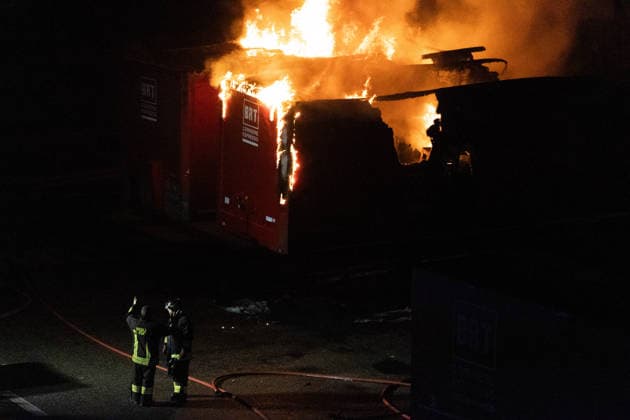 July 8, 2026, Milan, Mi, Italy: Firefighters are working to extinguish a fire that broke out at the logistics hub of BRT S.p.A., an Italian company operating in the freight transport sector. Milan Italy  - ZUMAc276 20260708_zip_c276_009 Copyright: xAndreaxCarrubbax