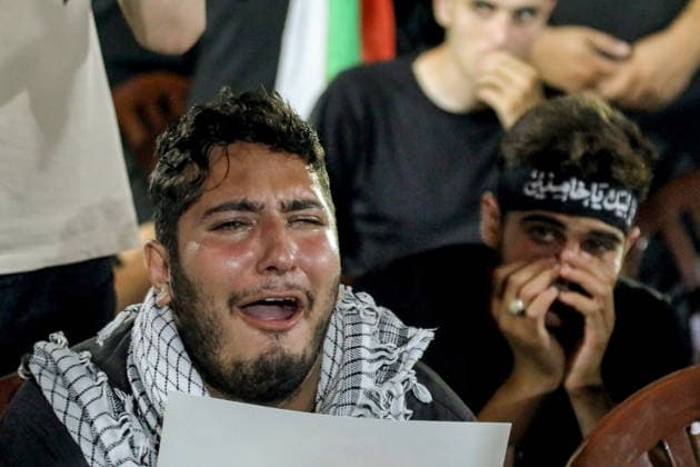 July 8, 2026, Beirut, Beirut, Lebanon: A pro-Iranian Hezbollah supporter weeps during a memorial ceremony mourning the assassinated Iranian Supreme Leader Ali Khamenei in Beirut southern suburb. Iran began six days of public funeral ceremonies for Khamenei on July 4, including a dedicated day to neighboring Iraq, a Shia powerhouse with close ties to Tehran. Beirut Lebanon - ZUMAn313 20260708_zip_n313_005 Copyright: xMarwanxNaamanix