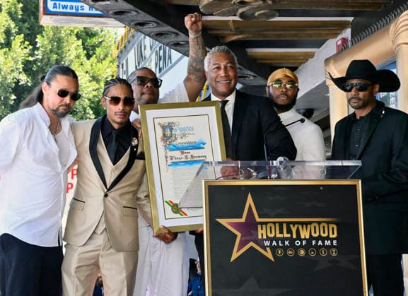 Bizzy Bone, Layzie Bone, Wish Bone, Flesh-n-Bone and Krayzie Bone (L-R) of the Hip-Hop group Bone Thugs-N-Harmony receive an honors certificate from the city of Los Angeles during a ceremony honoring them with the 2,851st star on the Hollywood Walk of Fame in Los Angeles on Wednesday, July 8, 2026.  LAP20260708010 JIMxRUYMEN