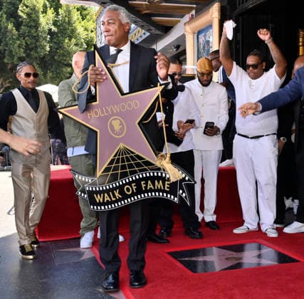 The star of Hip-Hop group Bone Thugs-N-Harmony is unveiled during a ceremony honoring them with the 2,851st star on the Hollywood Walk of Fame in Los Angeles on Wednesday, July 8, 2026.  LAP2026070801 JIMxRUYMEN