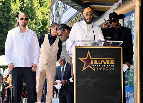 Bizzy Bone, Layzie Bone, Wish Bone, Flesh-n-Bone and Krayzie Bone (L-R) of the Hip-Hop group Bone Thugs-N-Harmony gather around their star during a ceremony honoring them with the 2,851st star on the Hollywood Walk of Fame in Los Angeles on Wednesday, July 8, 2026.  LAP2026070813 JIMxRUYMEN
