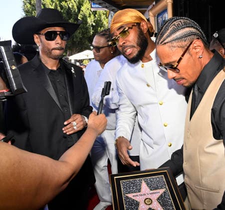Krayzie Bone, Flesh-n-Bone and Layzie Bone (L-R) of the Hip-Hop group Bone Thugs-N-Harmony speak with reporters during a ceremony honoring them with the 2,851st star on the Hollywood Walk of Fame in Los Angeles on Wednesday, July 8, 2026.  LAP2026070804 JIMxRUYMEN