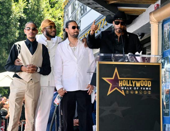 Layzie Bone, Flesh-n-Bone Flesh-n-Bone, Bizzy Bone and Krayzie Bone (L-R) of the Hip-Hop group Bone Thugs-N-Harmony make comments during a ceremony honoring them with the 2,851st star on the Hollywood Walk of Fame in Los Angeles on Wednesday, July 8, 2026.  LAP2026070809 JIMxRUYMEN