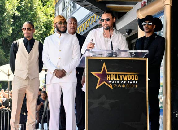 Layzie Bone, Flesh-n-Bone, Bizzy Bone and Krayzie Bone (L-R) of the Hip-Hop group Bone Thugs-N-Harmony make comments during a ceremony honoring them with the 2,851st star on the Hollywood Walk of Fame in Los Angeles on Wednesday, July 8, 2026.  LAP2026070815 JIMxRUYMEN