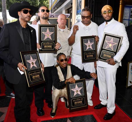 Krayzie Bone, Bizzy Bone, Layzie Bone, Wish Bone and Flesh-n-Bone (L-R) of the Hip-Hop group Bone Thugs-N-Harmony hold replica plaques during a ceremony honoring them with the 2,851st star on the Hollywood Walk of Fame in Los Angeles on Wednesday, July 8, 2026.  LAP2026070823 JIMxRUYMEN