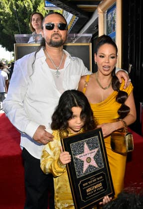 Bizzy Bone (L) of the Hip-Hop group Bone Thugs-N-Harmony is joined by his wife Jessica Cassidy and their son Jessy Anderson during a ceremony honoring them with the 2,851st star on the Hollywood Walk of Fame in Los Angeles on Wednesday, July 8, 2026.  LAP2026070827 JIMxRUYMEN