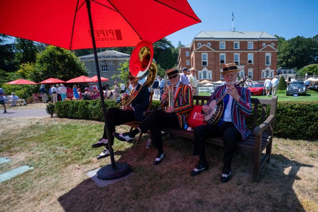 July 8, 2026, Epsom, Surrey, United Kingdom: A Rag Time trio perform during the 2026 RAC Woodcote Concours. The Royal Automobile Club hosted its second Concours at Woodcote Park in Epsom. More than 50 exceptional vehicles, representing over a century of motoring history, were displayed across the estate. The collection included veteran, vintage, classic, racing and supercars, as well as an impressive selection of motorcycles. Epsom United Kingdom - ZUMAs197 20260708_aaa_s197_117 Copyright: xJamesxWilloughbyx