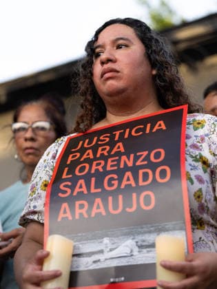 July 8, 2026, Houston, Texas, USA: During a vigil following the death of Lorenzo Salgado Araujos, a protester stands in Magnolia Park, Wednesday, July 8, in Houston, Texas. Houston USA - ZUMAg287 20260708_zsp_g287_104 Copyright: xMatthewxGuzmanx