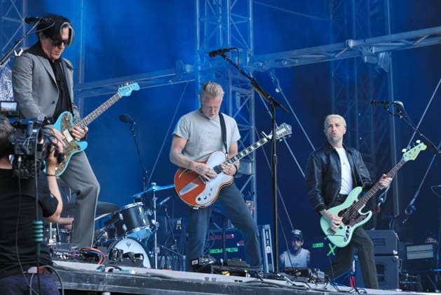 08.07.2026, Queens Of The Stone Age, Troy Van Leeuwen, Josh Homme, Michael Shuman live im Olympiastadion, Berlin, Berlin Berlin *** July 8, 2026, Queens of the Stone Age, Troy Van Leeuwen, Josh Homme, Michael Shuman live at the Olympic Stadium, Berlin, Berlin Berlin