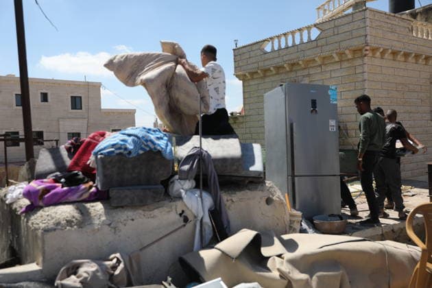 Israeli forces demolish home in southern West Bank town of Yatta Israeli forces demolish the two-story home of Palestinian resident Iyad Musleh al-Amour in the Khallet al-Miyeh area, east of the town of Yatta, south of Hebron in the occupied West Bank, on July 9, 2026. The house was home to three families comprising 15 people. According to local residents, the demolition was carried out on the grounds that the building lacked a permit, leaving the families displaced. Photo by Mamoun Wazwaz apaimages Hebron West Bank Palestinian Territory 090726_Hebron_MW_00(25) Copyright: xapaimagesxMamounxWazwazx xapaimagesx