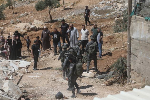 Israeli forces demolish home in southern West Bank town of Yatta Israeli forces demolish the two-story home of Palestinian resident Iyad Musleh al-Amour in the Khallet al-Miyeh area, east of the town of Yatta, south of Hebron in the occupied West Bank, on July 9, 2026. The house was home to three families comprising 15 people. According to local residents, the demolition was carried out on the grounds that the building lacked a permit, leaving the families displaced. Photo by Mamoun Wazwaz apaimages Hebron West Bank Palestinian Territory 090726_Hebron_MW_00(19) Copyright: xapaimagesxMamounxWazwazx xapaimagesx