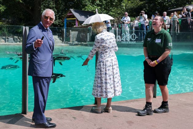 July 9, 2026, London, London, UK: London, UK. King Charles III jokes with the crowd while holding a laser pointer used to attract Humboldt penguins at Penguin Beach during a visit to London Zoo marking the 200th anniversary of the Zoological Society of London. London UK  - ZUMAl94_ 20260709_zaf_l94_014 Copyright: xDinendraxHariax