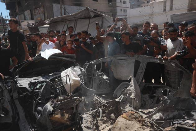 Palestinians gather at site of Israeli strike in western Gaza City Palestinians gather at the site of an Israeli strike that targeted a vehicle west of Gaza City, Gaza Strip, on July 9, 2026. According to local sources, the strike killed one person and wounded others. Photo by Hadi Daoud apaimages Gaza city Gaza Strip Palestinian Territory 090726_Gaza_HD_01(15) Copyright: xapaimagesxHadixDaoudx xapaimagesx