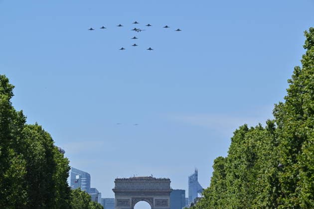 Bastille Day parade rehearsal in Paris PARIS, FRANCE - JULY 09: French military aircraft fly over the Arc de Triomphe during a rehearsal for the upcoming Bastille Day parade on the Champs-Elysees Avenue in Paris, France, on July 9, 2026. Mustafa Yalcin Anadolu Paris France. Editorial use only. Please get in touch for any other usage.  Copyright: x2026xAnadoluxMustafaxYalcinx