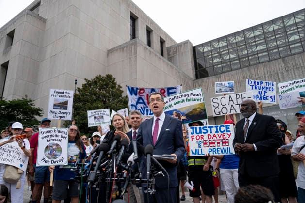 Norm Eisen, an attorney for Olympic canoeist David Hearn, speaks to the press after Hearn pleaded not guilty to damaging the Lincoln Memorial Reflecting Pool in Washington, DC on Thursday, June 9, 2026. Hearn was indicted on July 2 on one count of destruction of property of more than $1,000 for allegedly damaging the Reflecting Pool, carrying a maximum pentyl of 10 years in prison if convicted.  WAP20260709312 BONNIExCASH