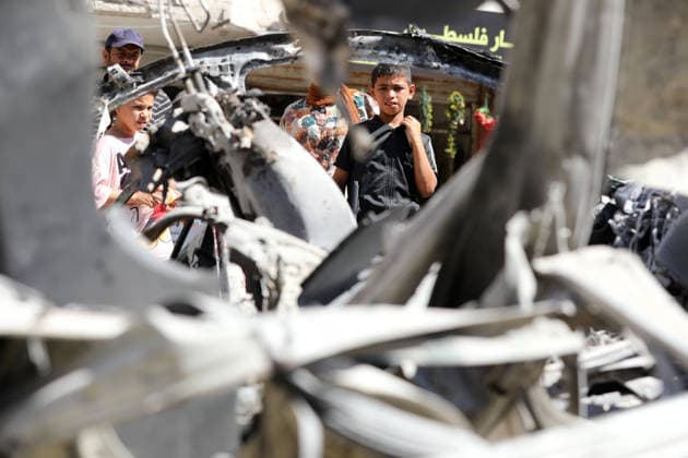 Palestinians gather at site of Israeli strike in western Gaza City Palestinians gather at the site of an Israeli strike that targeted a vehicle west of Gaza City, Gaza Strip, on July 9, 2026. According to local sources, the strike killed one person and wounded others. Photo by Bilal Osama apaimages Gaza city Gaza Strip Palestinian Territory 090726_Gaza_BO_02(20) Copyright: xapaimagesxBilalxOsamax xapaimagesx