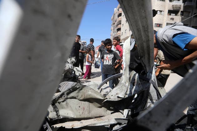 Palestinians gather at site of Israeli strike in western Gaza City Palestinians gather at the site of an Israeli strike that targeted a vehicle west of Gaza City, Gaza Strip, on July 9, 2026. According to local sources, the strike killed one person and wounded others. Photo by Bilal Osama apaimages Gaza city Gaza Strip Palestinian Territory 090726_Gaza_BO_02(8) Copyright: xapaimagesxBilalxOsamax xapaimagesx