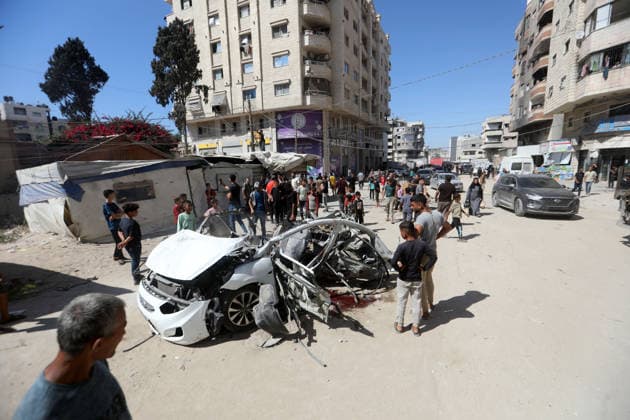 Palestinians gather at site of Israeli strike in western Gaza City Palestinians gather at the site of an Israeli strike that targeted a vehicle west of Gaza City, Gaza Strip, on July 9, 2026. According to local sources, the strike killed one person and wounded others. Photo by Bilal Osama apaimages Gaza city Gaza Strip Palestinian Territory 090726_Gaza_BO_02(9) Copyright: xapaimagesxBilalxOsamax xapaimagesx