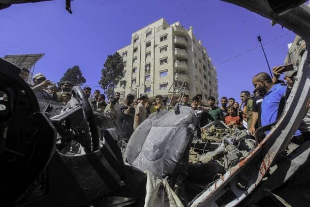 RECORD DATE NOT STATED One Killed, Three Injured After Airstrike Hits Vehicle in Western Gaza City (INT) One Killed, Three Injured After Airstrike Hits Vehicle in Western Gaza City. July 9, 2026, Gaza, Palestine: Palestinians inspect a civilian vehicle after it was struck in an airstrike at Haidar Roundabout, west of Gaza City. According to medical sources, one person was killed and three others were injured in the strike. The casualties were transferred to Al-Shifa Medical Complex as emergency teams responded to the scene. Credit: Hashem Zimmo TheNews2(Foto: Hashem Zimmo Thenews2 imago images) One Killed, Three Injured After Airstrike Hits Vehicle in Western Gaza City  Copyright: xHashemxZimmox