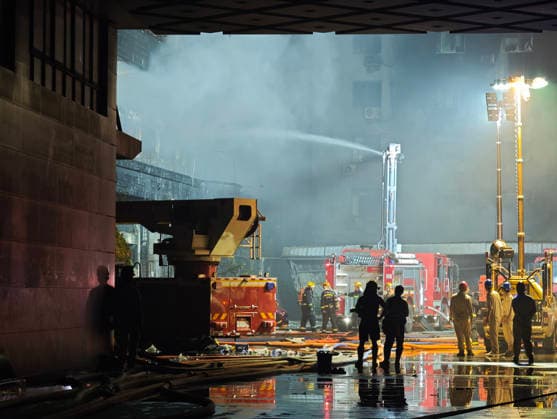 (260709) -- JINJIANG, July 9, 2026 -- A fire truck works after a fire broke out at a shoe factory in Jiangtou Village, Chendai Township of Jinjiang City, southeast China s Fujian Province, on July 9, 2026. Twenty-eight people have been killed following a fire at a shoe factory in Jinjiang City on Thursday, local authorities said. ) (SpotNews)CHINA-FUJIAN-JINJIANG-SHOE FACTORY-FIRE (CN) ZhouxYi 