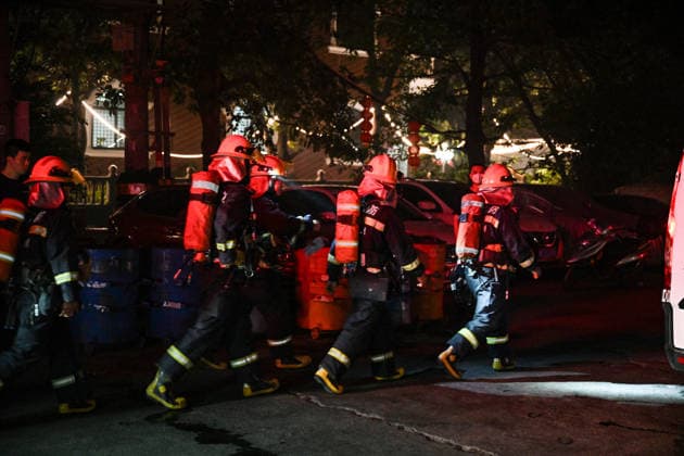 (260709) -- JINJIANG, July 9, 2026 -- Firefighters work after a fire broke out at a shoe factory in Jiangtou Village, Chendai Township of Jinjiang City, southeast China s Fujian Province, on July 9, 2026. Twenty-eight people have been killed following a fire at a shoe factory in Jinjiang City on Thursday, local authorities said. ) (SpotNews)CHINA-FUJIAN-JINJIANG-SHOE FACTORY-FIRE (CN) ZhouxYi 