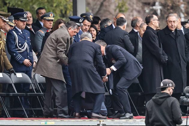 Santiago, July 9, 2026 Minister Francisco Undurraga is helped to his feet by other officials after briefly falling just as they asked everyone to stand. President José Antonio Kast participates in the 2026 Oath to the Flag ceremony at the Plaza de la Ciudadanía. Diego Martin Aton, Chile, Aton 1171157 jpeg  Copyright: DIEGOxMARTIN ATONxCHILE