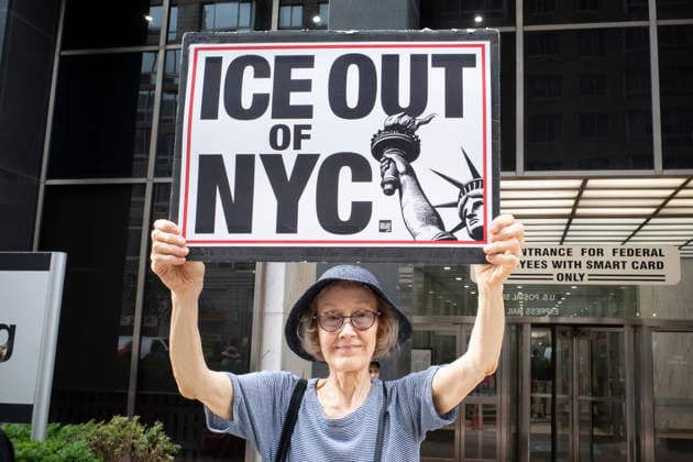 July 9, 2026, New York, New York, USA: A protester holds a sign that reads ICE OUT OF NYC with an image of the Statue of Liberty at Rise and Resist s weekly vigil for those impacted by President Trump s immigrant detention and mass deportation policies, held outside the immigration courts, Department of Homeland Security and ICE offices at 26 Federal Plaza in Lower Manhattan. The demonstration takes place days after the death of L. Salgado Araujo who was shot and killed by U.S. Immigration and Customs Enforcement (ICE) in Houston during a targeted enforcement operation. New York USA  - ZUMAr174 20260709_znp_r174_007 Copyright: xGinaxMxRandazzox