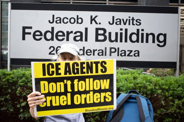 July 9, 2026, New York, New York, USA: A protester holds a sign that reads ICE AGENTS Don t follow cruel orders at Rise and Resist s weekly vigil for those impacted by President Trump s immigrant detention and mass deportation policies, held outside the immigration courts, Department of Homeland Security and ICE offices at 26 Federal Plaza in Lower Manhattan. The demonstration takes place days after the death of L. Salgado Araujo who was shot and killed by U.S. Immigration and Customs Enforcement (ICE) in Houston during a targeted enforcement operation. New York USA  - ZUMAr174 20260709_znp_r174_011 Copyright: xGinaxMxRandazzox