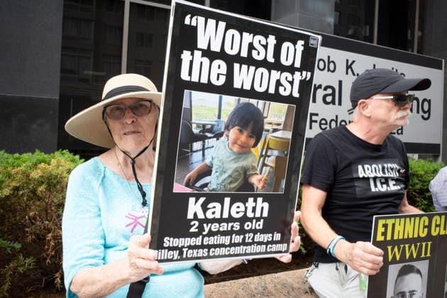 July 9, 2026, New York, New York, USA: A protester holds a sign that reads Worst of the worst Kaleth 2 years old Stopped eating for 12 days in Dilley, Texas concentration camp with his picture at Rise and Resist s weekly vigil for those impacted by President Trump s immigrant detention and mass deportation policies, held outside the immigration courts, Department of Homeland Security and ICE offices at 26 Federal Plaza in Lower Manhattan. The demonstration takes place days after the death of L. Salgado Araujo who was shot and killed by U.S. Immigration and Customs Enforcement (ICE) in Houston during a targeted enforcement operation. New York USA  - ZUMAr174 20260709_znp_r174_012 Copyright: xGinaxMxRandazzox