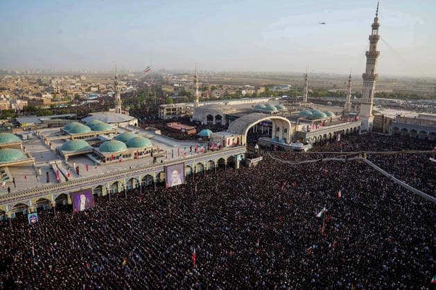 Mourners gather around the casket of Iran s late Supreme Leader Ayatollah Ali Khamenei in the city of Mashhad in Iran on Thursday, July 9, 2026. His body will be laid to rest at the shrine of Imam Reza, one of Iran s most revered Islamic sites. Khamenei and members of his family were killed on February 28 during U.S.-Israeli airstrikes at the onset of the war.  IRN2026070910 IranianxSupremexLeader SxOffice