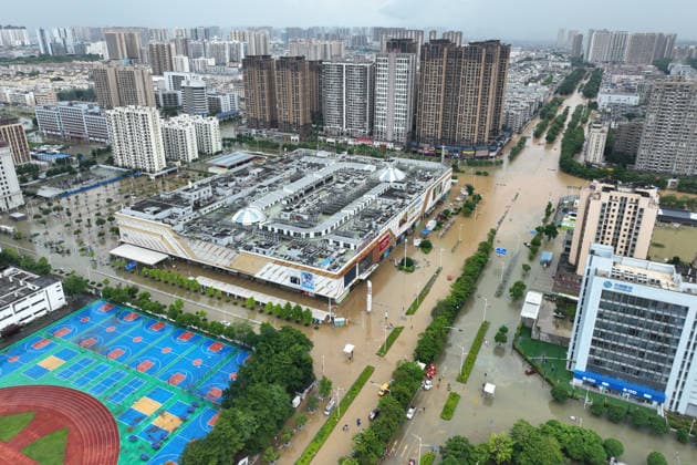 GUIGANG, CHINA - JULY 09: Aerial view of waterlogged roads in the urban area of Guigang on July 9, 2026 in Guigang, Guangxi Zhuang Autonomous Region of China. Recent extreme rainstorms triggered by Typhoon Maysak, the 10th typhoon of the year, have caused severe flooding in parts of Guangxi in the Pearl River basin. Guangxi is continuing its search and rescue operations for missing persons, enhancing resettlement services for affected residents and advancing post-disaster reconstruction.  Copyright: xChinaxNewsxServicex 111653326823
