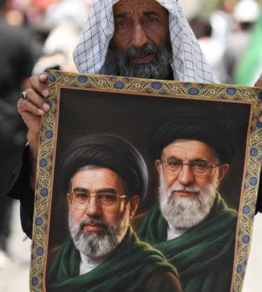 (260710) -- MASHHAD, July 10, 2026 -- People attend the funeral procession of Iran s late Supreme Leader Ali Khamenei in Mashhad, Iran, July 9, 2026. Ali Khamenei was laid to rest in the northeastern Iranian city of Mashhad on Thursday. Shadati) IRAN-MASHHAD-LATE SUPREME LEADER-ALI KHAMENEI-MOURNING ShaxDati 