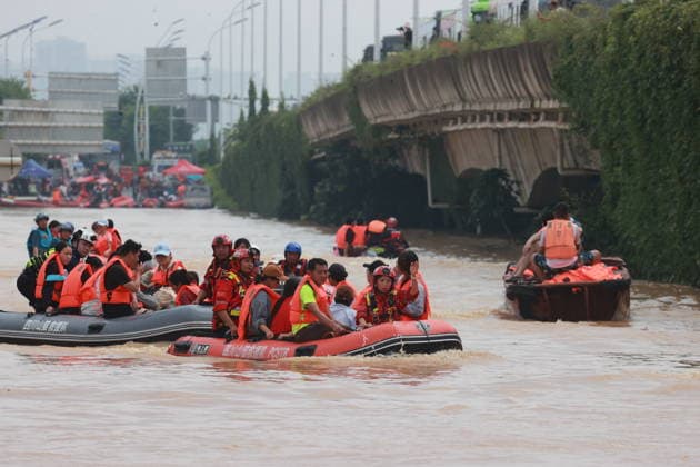GUIGANG, CHINA - JULY 09: Rescuers evacuate trapped students on July 9, 2026 in Guigang, Guangxi Zhuang Autonomous Region of China. Recent extreme rainstorms triggered by Typhoon Maysak, the 10th typhoon of the year, have caused severe flooding in parts of Guangxi in the Pearl River basin. Guangxi is continuing its search and rescue operations for missing persons, enhancing resettlement services for affected residents and advancing post-disaster reconstruction.  Copyright: xVCGx 111653352903