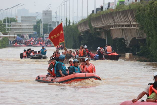 GUIGANG, CHINA - JULY 09: Rescuers evacuate trapped students on July 9, 2026 in Guigang, Guangxi Zhuang Autonomous Region of China. Recent extreme rainstorms triggered by Typhoon Maysak, the 10th typhoon of the year, have caused severe flooding in parts of Guangxi in the Pearl River basin. Guangxi is continuing its search and rescue operations for missing persons, enhancing resettlement services for affected residents and advancing post-disaster reconstruction.  Copyright: xVCGx 111653352902