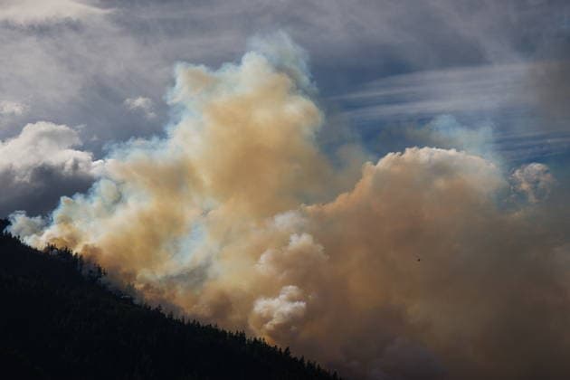 July 9, 2026, Boston Bar, Bc, CANADA: A helicopter is used to survey the Brunswick Creek wildfire in Boston Bar, B.C., on Thursday, July 9, 2026. Boston Bar CANADA  - ZUMAc35_ 20260709_zaf_c35_065 Copyright: xDarrylxDyckx