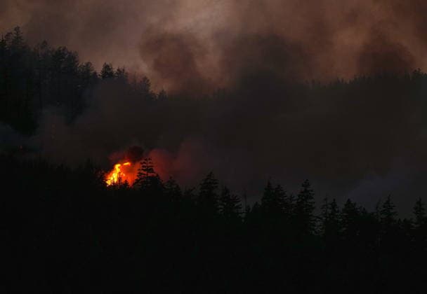 July 9, 2026, Boston Bar, Bc, CANADA: The Brunswick Creek wildfire consumes trees on a mountainside, in Boston Bar, B.C., on Thursday, July 9, 2026. Boston Bar CANADA  - ZUMAc35_ 20260709_zaf_c35_106 Copyright: xDarrylxDyckx