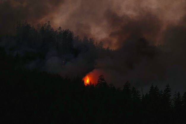July 9, 2026, Boston Bar, Bc, CANADA: The Brunswick Creek wildfire consumes trees on a mountainside, in Boston Bar, B.C., on Thursday, July 9, 2026. Boston Bar CANADA  - ZUMAc35_ 20260709_zaf_c35_109 Copyright: xDarrylxDyckx