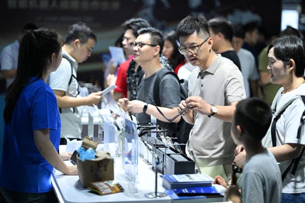 2026 AI Terminal Industry Expo NANJING, CHINA - JULY 10, 2026 - Visitors experience smart glasses at the Qwen AI Glasses booth at the 2026 Artificial Intelligence Terminal Industry Expo in Nanjing, Jiangsu Province, China on July 10, 2026. Nanjing Jiangsu China  Copyright: xCFOTOx i1783688704525