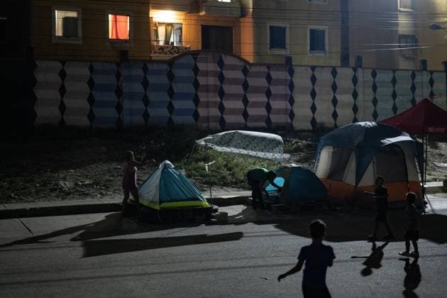 Earthquake survivors continue living in temporary shelters in La Guaira LA GUAIRA, VENEZUELA - JULY 10: Residents stay in tents set up outside their homes in La Guaira, Venezuela, on July 10, 2026, after the powerful 7.2 and 7.5 magnitude earthquakes that struck the country in succession on June 24 caused widespread destruction in the coastal city. Many families continue to sleep outdoors as their homes remain damaged or unsafe. Cem Tekkesinoglu Anadolu La Guaira Venezuela. Editorial use only. Please get in touch for any other usage.  Copyright: x2026xAnadoluxCemxTekkesinoglux