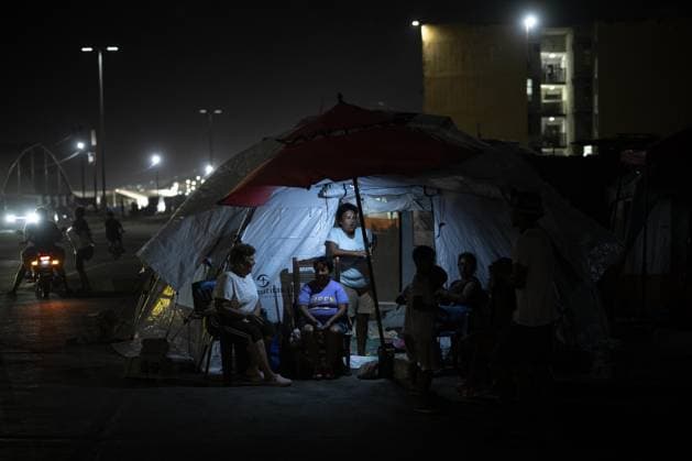 Earthquake survivors continue living in temporary shelters in La Guaira LA GUAIRA, VENEZUELA - JULY 10: Residents gather outside temporary shelters in La Guaira, Venezuela, on July 10, 2026. Many families continue to live in tents after the powerful 7.2 and 7.5 magnitude earthquakes that struck Venezuela in succession on June 24 caused widespread destruction in the coastal city, forcing thousands of people to leave their homes. Cem Tekkesinoglu Anadolu La Guaira Venezuela. Editorial use only. Please get in touch for any other usage.  Copyright: x2026xAnadoluxCemxTekkesinoglux