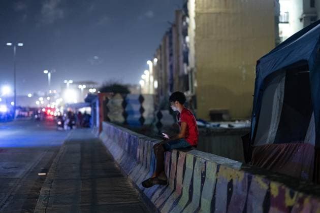 Earthquake survivors continue living in temporary shelters in La Guaira LA GUAIRA, VENEZUELA - JULY 10: A child sits near a temporary shelter in La Guaira, Venezuela, on July 10, 2026. Residents continue to stay in tents after the powerful 7.2 and 7.5 magnitude earthquakes that struck Venezuela in succession on June 24 caused widespread destruction in the coastal city, forcing thousands of people to leave their homes. Cem Tekkesinoglu Anadolu La Guaira Venezuela. Editorial use only. Please get in touch for any other usage.  Copyright: x2026xAnadoluxCemxTekkesinoglux