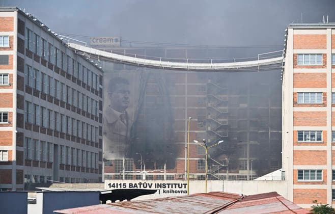 The situation following a fire at Building No. 34, an 11-story structure in the former Bata factory complex, on July 10, 2026, in Zlin, Czech Republic. A high-rise building in a former Bata shoe factory complex has been on fire on July 9, nobody was injured, but the property damage will be significant, as the building housed both warehouses and offices. (CTKxPhoto DaliborxGluck) CTKPhotoP2026071002384  CTKPhotoP2026071002384