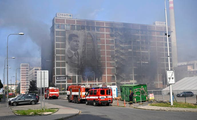 The situation following a fire at Building No. 34, an 11-story structure in the former Bata factory complex, on July 10, 2026, in Zlin, Czech Republic. A high-rise building in a former Bata shoe factory complex has been on fire on July 9, nobody was injured, but the property damage will be significant, as the building housed both warehouses and offices. (CTKxPhoto DaliborxGluck) CTKPhotoP2026071002387  CTKPhotoP2026071002387