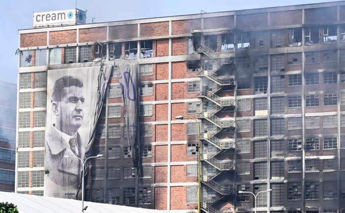 The situation following a fire at Building No. 34, an 11-story structure in the former Bata factory complex, on July 10, 2026, in Zlin, Czech Republic. A high-rise building in a former Bata shoe factory complex has been on fire on July 9, nobody was injured, but the property damage will be significant, as the building housed both warehouses and offices. (CTKxPhoto DaliborxGluck) CTKPhotoP2026071002406  CTKPhotoP2026071002406