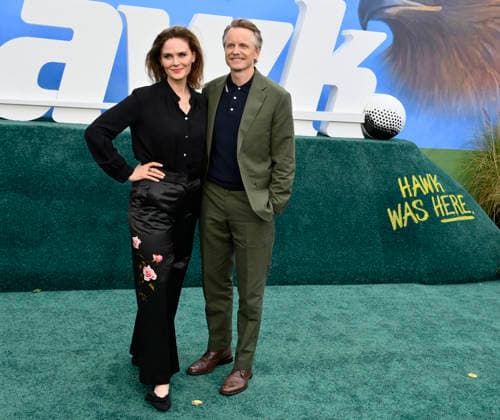 Cast member David Hornsby (R) and his wife, actress Emily Deschanel attend the premiere of the Netflix sport comedy TV series The Hawk at the Directors Village in the Westwood section of Los Angeles on Thursday, July 9, 2026. Storyline Follows Lonnie Hawkins, 2004 s top golfer, as he struggles to recapture his magic late in his career, refusing to believe he s anything other than one stroke away from golf s greatest comeback.  LAP2026070940 JIMxRUYMEN