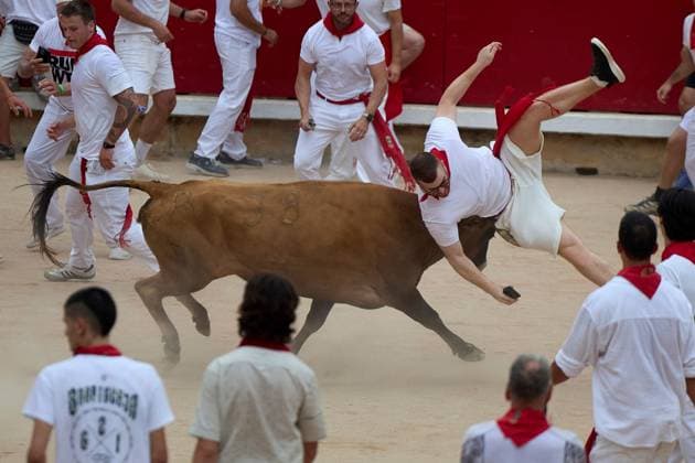 Participants await vaquillas event after fourth San Fermin bull run PAMPLONA, SPAIN JULY 10, 2026: Participants wait by the bullpens gate for the release of a heifer during the vaquillas event following the fourth running of the bulls of the San Fermin festival in Pamplona, northern Spain, on July 10, 2026. Pamplona Spain Copyright: x xUnaixBeroizx xJNAxPressx