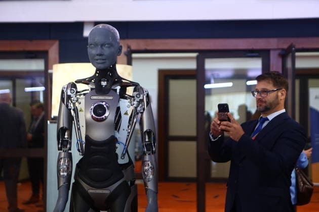 July 10, 2026, Athens, Greece: AMECA robot speaks with one philosopher and one preast at 30th Annual Government Roundtable Economist conference. Ameca is the worldÃ¢â‚¬â ¢s leading social humanoid robot, created by UK robotics company Engineered Arts. First unveiled in 2021, Ameca was designed for advanced, natural and engaging human-robot interaction, combining artificial intelligence, expressive and realistic facial movements, and lifelike gestures. Athens Greece  - ZUMAv62_ 20260710_zaf_v62_001 Copyright: xAristidisxVafeiadakisx