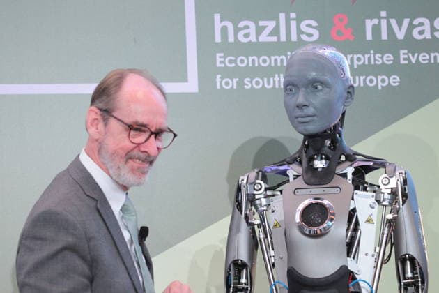 July 10, 2026, Athens, Greece: AMECA robot speaks with one philosopher and one preast at 30th Annual Government Roundtable Economist conference. Ameca is the worldÃ¢â‚¬â ¢s leading social humanoid robot, created by UK robotics company Engineered Arts. First unveiled in 2021, Ameca was designed for advanced, natural and engaging human-robot interaction, combining artificial intelligence, expressive and realistic facial movements, and lifelike gestures. Athens Greece  - ZUMAv62_ 20260710_zaf_v62_021 Copyright: xAristidisxVafeiadakisx